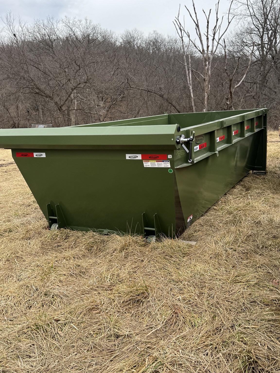 Green roll-off dumpster available for rental from KD Site Solutions